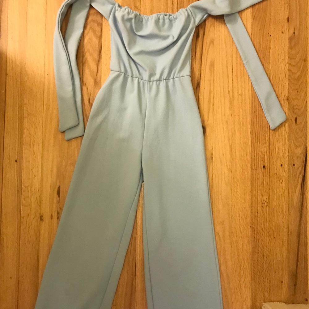 Blue strapless jumpsuit with tie arms